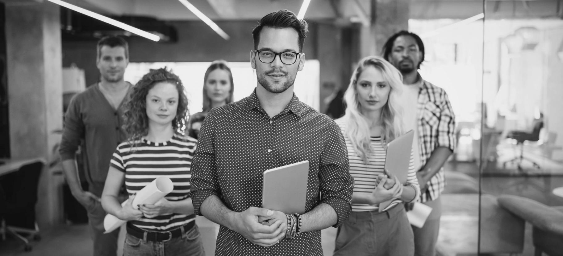 Journalism students reviewing story notes and conducting research
